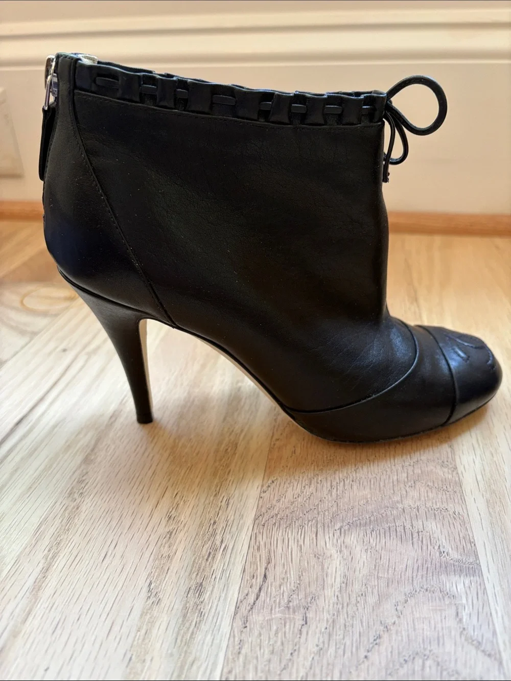 CHANEL Black Leather Ankle Booties with Bow-Trim and CC Toe